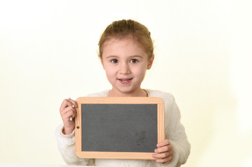 blonde girl with a slate