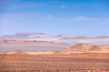 Fototapeta na wymiar Desert view Paracas National Reserve, desert sand mountains.