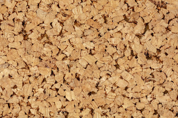 Close up shot of surface of cork floor, wall texture for background or devices wallpapers. Abstract design, usual, natural materials. Detailed grungy artwork. Copyspace, advertisement. Vintage style.