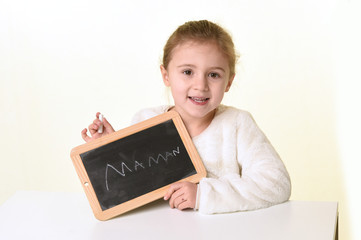 blonde girl with a slate