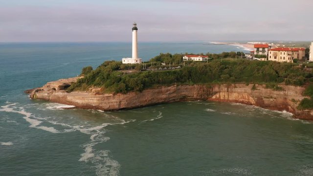Static drone shot of lighthouse. Atlantic Ocean, Cape Hainsart, Biarritz, France. Phare de Biarritz. 