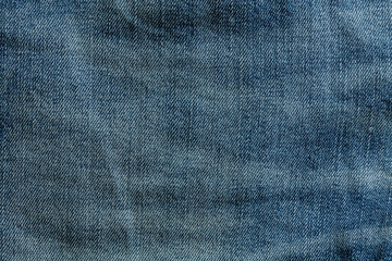 Close up shot of surface of jeans cloth texture for background or devices wallpapers. Abstract design, usual, natural materials. Detailed grungy artwork. Copyspace, advertisement. Vintage style.