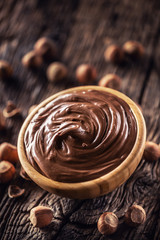 Chocolate hazelnut spread in wooden bowl - Close up
