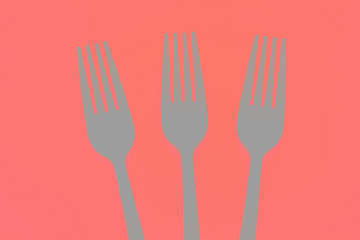 Plastic fork for casual food. White fork.
