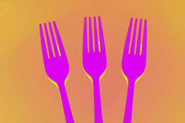 Plastic fork for casual food. White fork.