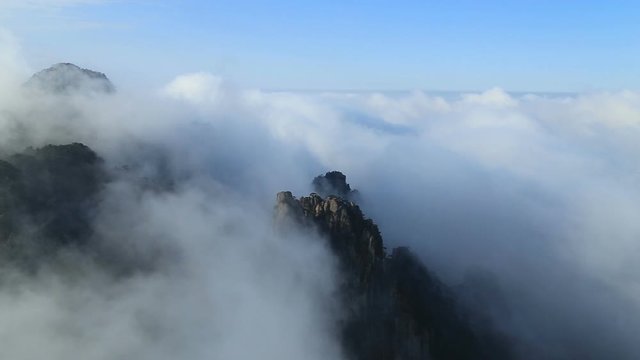 Mist, clouds rising in Huangshan national park, (Yellow Mountain) Anhui Porvince, China.