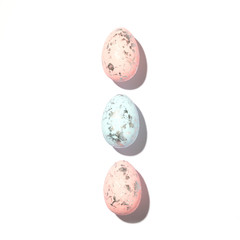 Easter colored eggs isolated on white background. Fashionable harsh sunlight.