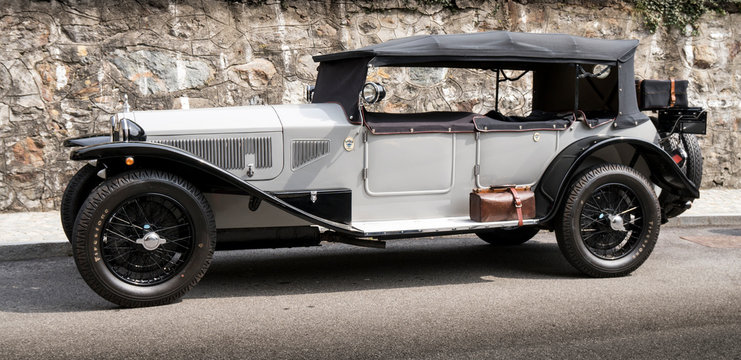 Antique car: Lancia Lambda at the international classic car rally in Fobello, the birthplace of Vincenzo Lancia, the founder of the car company. Fobello, Italy, September 03, 2016.