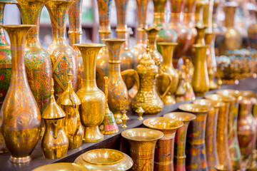 Typical traditional souvenir jugs in the store for tourists, painted with glaze.