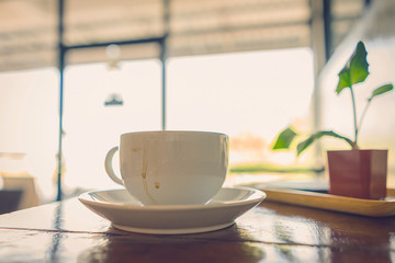 Coffee cup in film tone style. Copy space for text