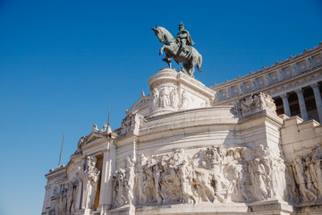 Fototapeta na wymiar Monument of Vittorio Emmanuel on Venice Square in Rome Italy, blue sky