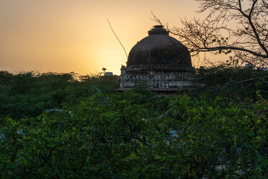 Sunset view of the Jamali Kamali Mosque, Mehrauli Archaeological Park loacted in Mehrauli, Delhi