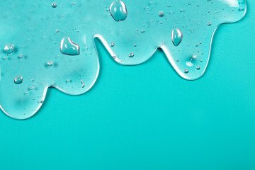 Hyaluronic acid gel. Textured background with oxygen bubbles on blue background.