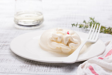 burrata, fresh italian cheese made from mozzarella and cream.