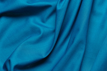 Blue fabric cloth texture. abstract texture background with soft waves.