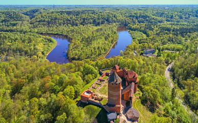 Beautiful aerial view of medieval Turaida castle at Gauja river valley, Sigulda, Latvia - obrazy, fototapety, plakaty