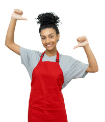 Happy latin american waitress with red apron