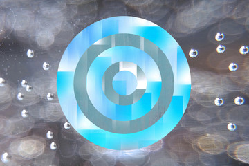 Abstraction in the form of a blue target on a background of depth with bubbles
