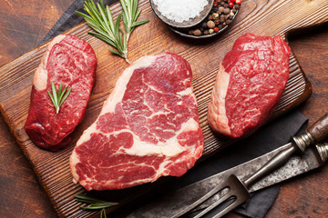 Variety of raw beef steaks