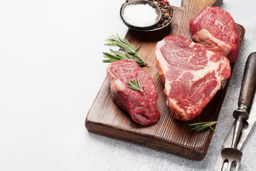 Variety of raw beef steaks