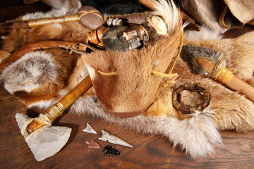 Stone Age Tools on wooden Background