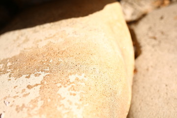  large beige stones, texture, outdoors in summer