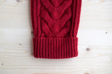 Sweater sleeve with cuff.  Knitted sweater is handmade from wool.