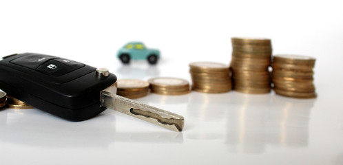 Miniature people with coins and car. Miniature businessman walking through a toy car. Concept of financial, retail, money saving and business. Turkey car price infilation. Car mortgage related