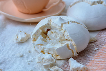 Classic meringue cookies for tea or coffee, close up