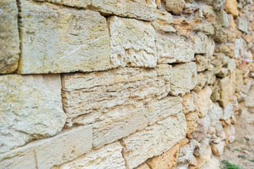 Close up stone wall of the antic Nymphaeum in Crimea