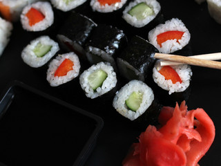 Set of Japanese rolls and sushi, top view
