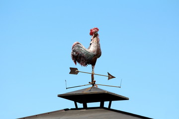 Wrought iron vintage retro weather vane instrument made to resemble arrow with proud rooster on top...