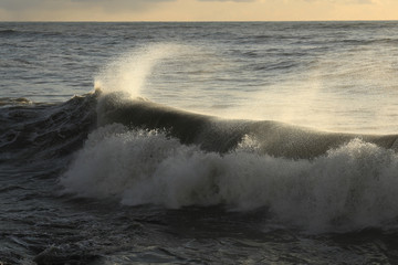 waves crashing on rocks