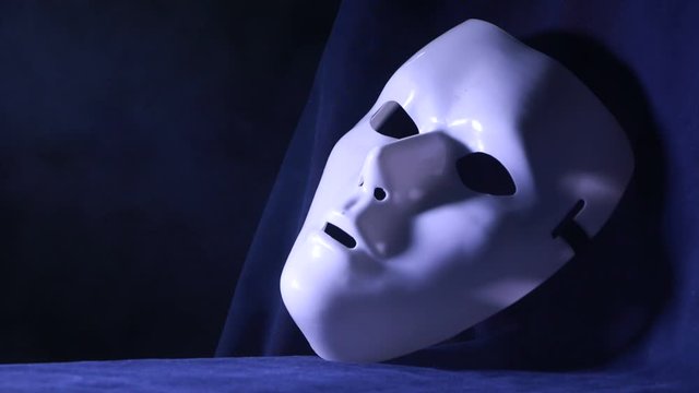 Close up of a white mystique mask 