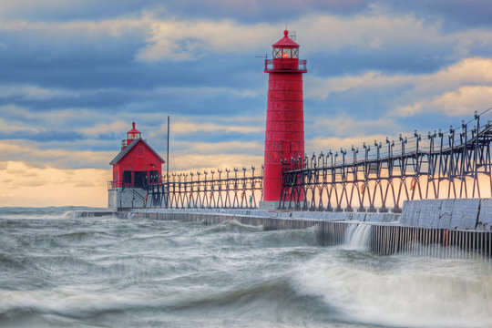Landscape of the Grand Haven Lighthouse, pier, and catwalk at dawn, Lake Michigan, Michigan, USA