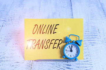 Writing note showing Online Transfer. Business concept for authorizes a fund transfer over an...
