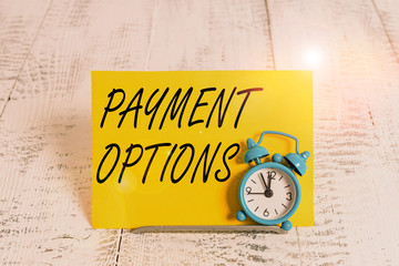 Writing note showing Payment Options. Business concept for ways that a customers can pay for the...