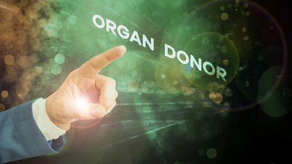 Conceptual hand writing showing Organ Donor. Concept meaning the act of donating an organ to a demonstrating needed a transplant
