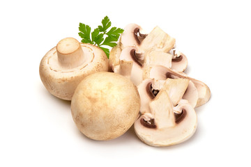 Sliced Champignon Mushrooms with parsely leaf, isolated on white background