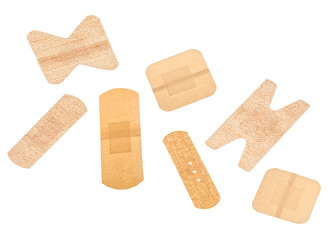 Set of multiple different adhesive sticking plaster isolated on a white background