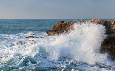 Coastal landscape with big stormy waves