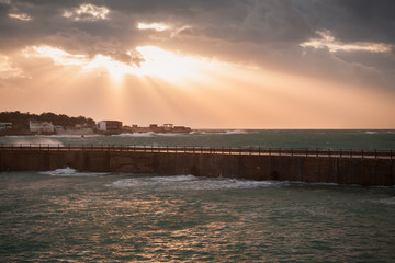 Montazah beach evening landscape with sunlight rays