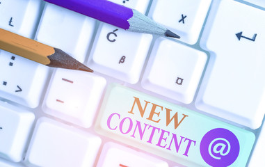 Text sign showing New Content. Business photo showcasing fresh valuable and relevant information or...
