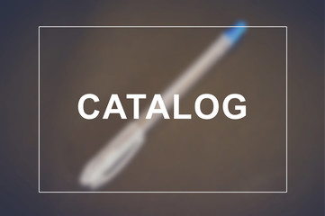 catalog word with blurring pen on desk background