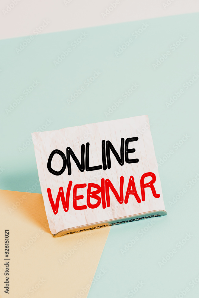 Poster writing note showing online webinar. business concept for online meeting or presentation held via th