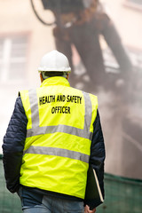 health and safety officer  working  in construction site to destroying  the bridge