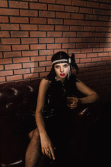 Figure of girl in gatsby style