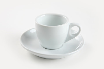 White ceramic coffee cup on white background.