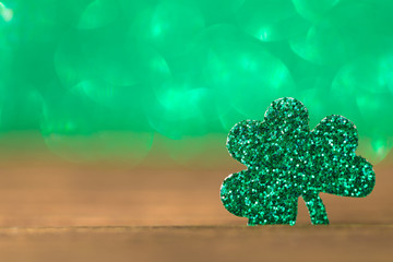 St Patrick's day background with shamrock clover leaf, Irish festival symbol, selective focus