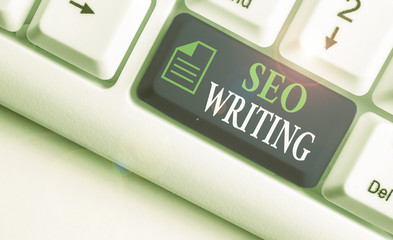 Writing note showing Seo Writing. Business concept for grabbing the attention of the search engines...